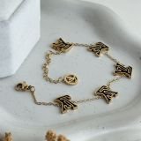 con Letter Charm Bracelet