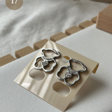 Noir Essence Earring Collection