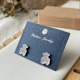 Noir Essence Earring Collection