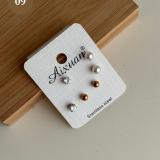 Noir Essence Earring Collection