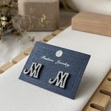 Noir Essence Earring Collection